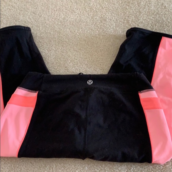RARE Lululemon Heat it Up Orange Pop and Black Leggings Size 8 - Picture 4 of 5